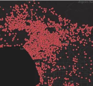 An excerpt of a map of Los Angeles is crowded with red dots representing price-gouged rental listings following the LA wildfires.